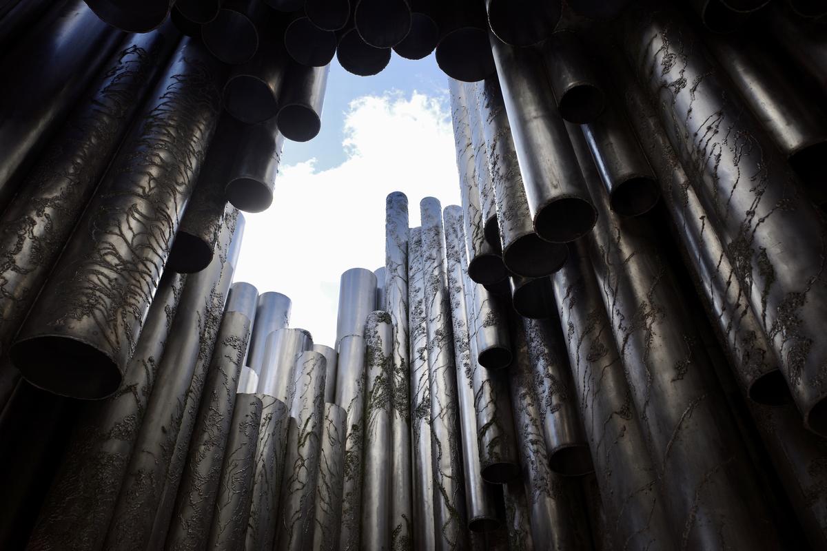 A look towards the sky through the pipes of Sibelius Monument