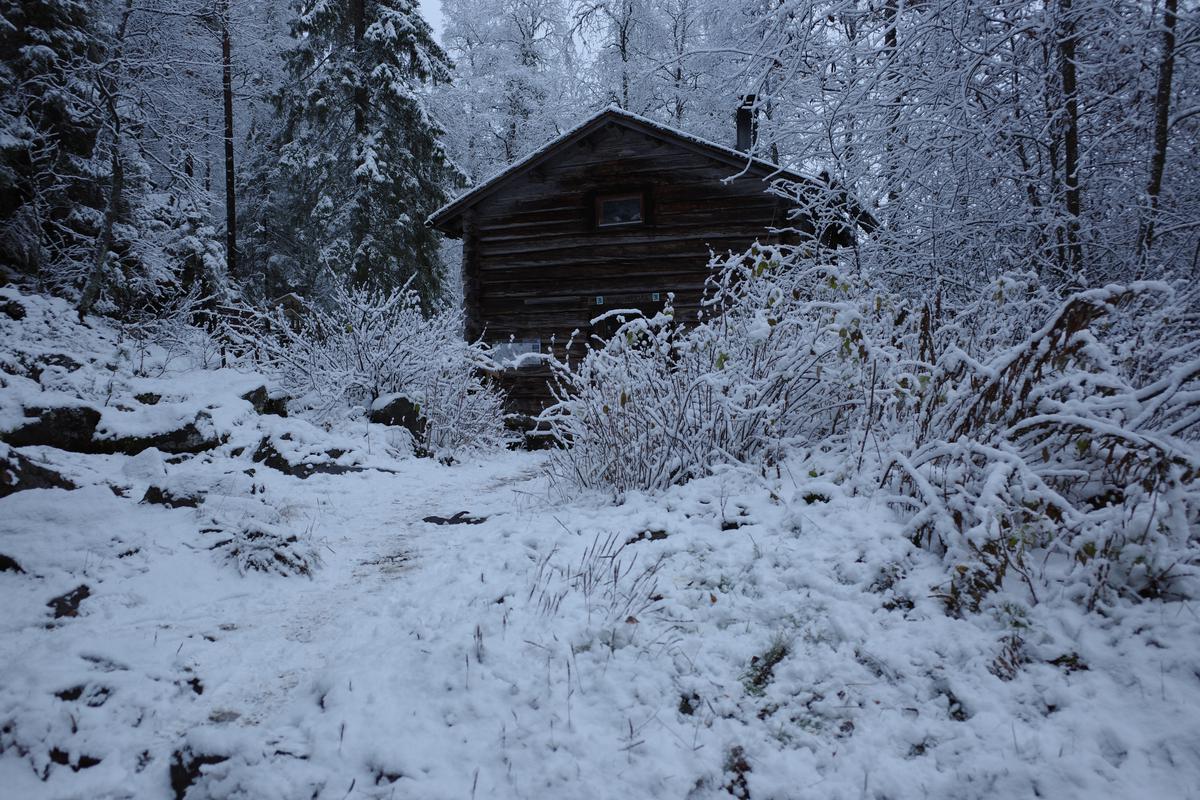 Taivalköngäs hut covered in snow